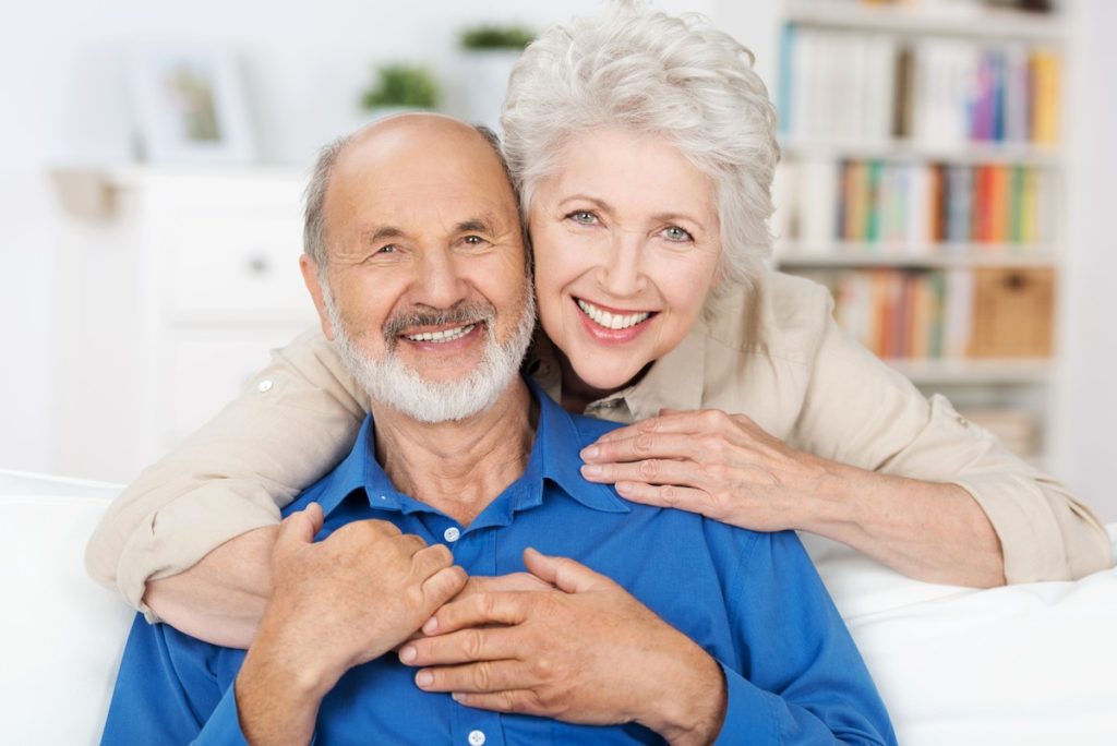 a old couple is clicking photos