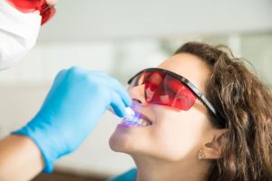 a lady is having cosmetic procedure
