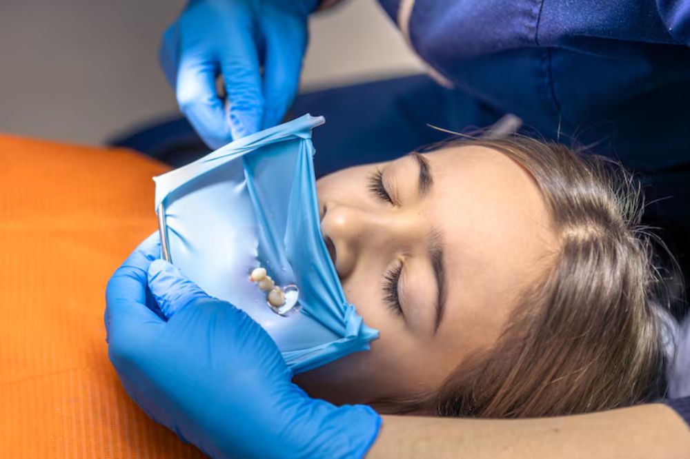 a lady having fluoride treatment
