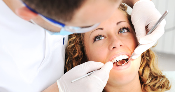 a lady is having general dentistry service