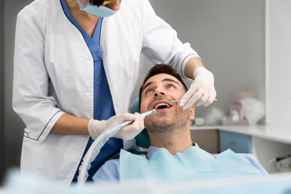 patient getting root canal treatment from dentist